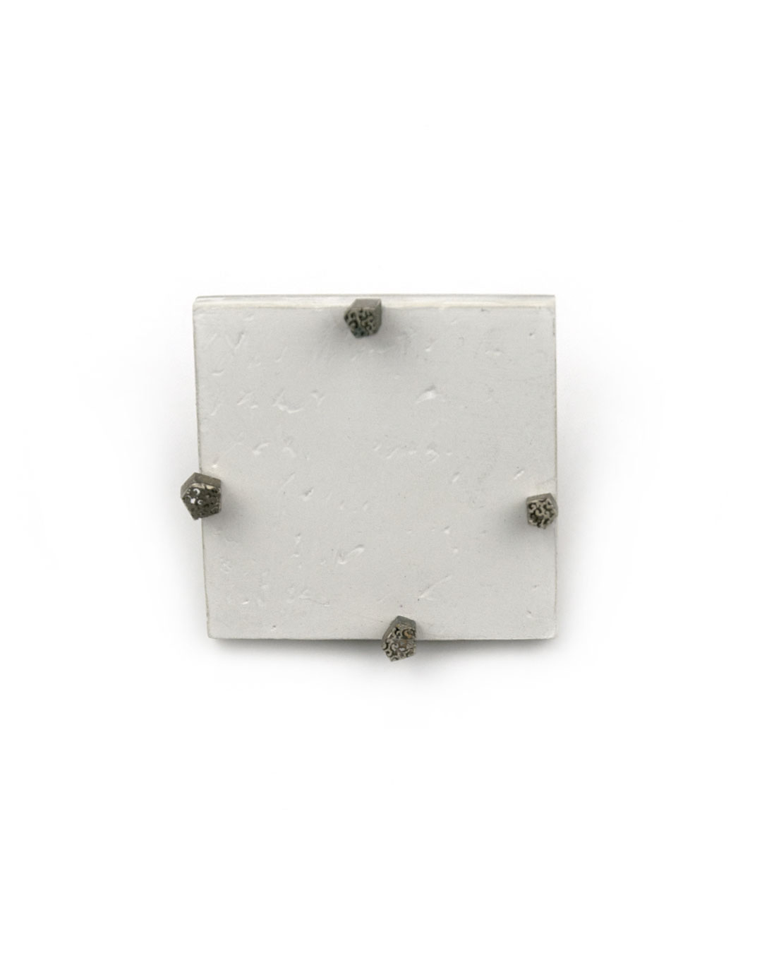 Piret Hirv, Letters of Flora 2, 1999, brooch; silver, plaster, paint, 48 x 49 x 15 mm, €435